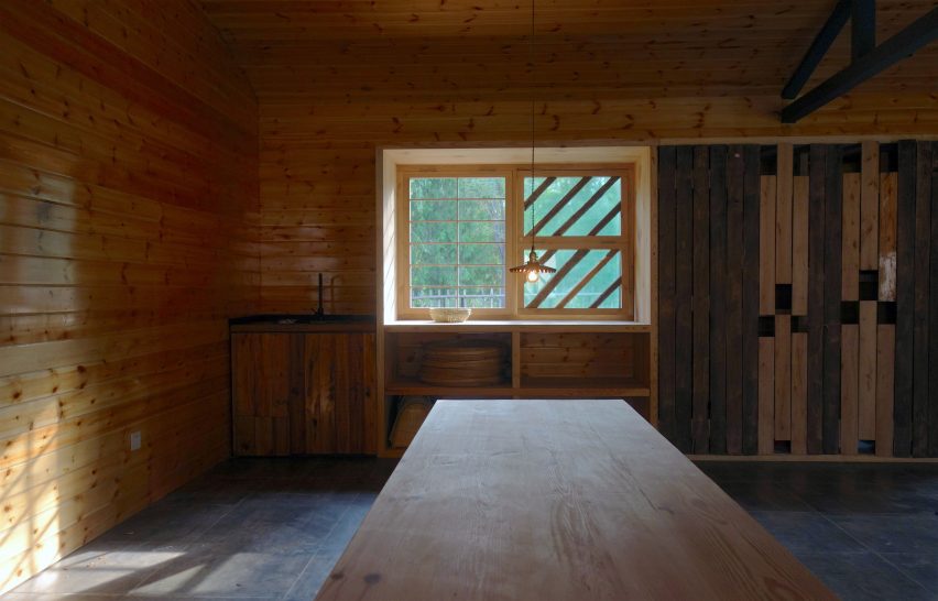Table in Huo-shui-yuan exhibition centre balances on rammed-earth legs