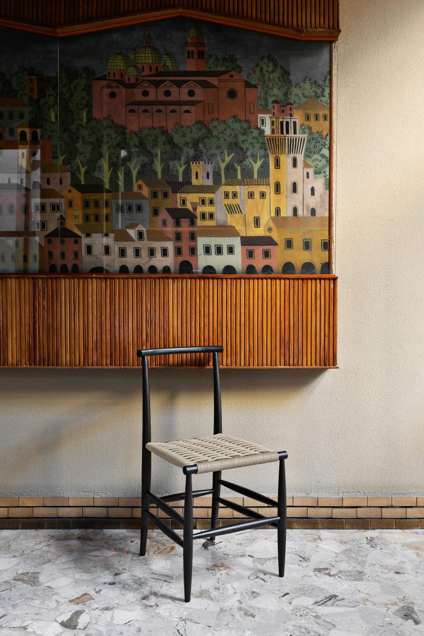 Black frame version of Pelleossa chair with rushed seat designed by Francesco Faccin for Miniforms