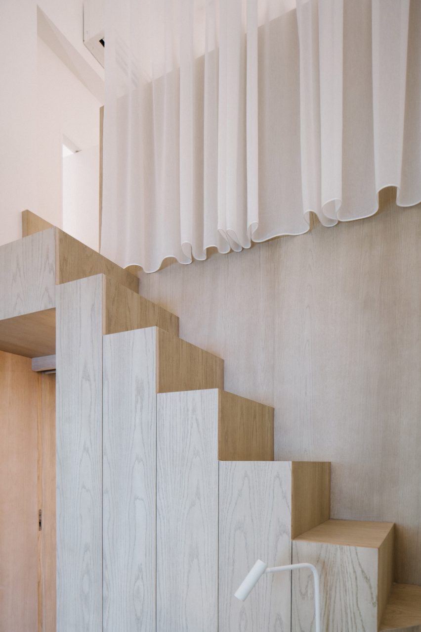 Stairs leading to mezzanine of of Project #13 by Studio Wills + Architects