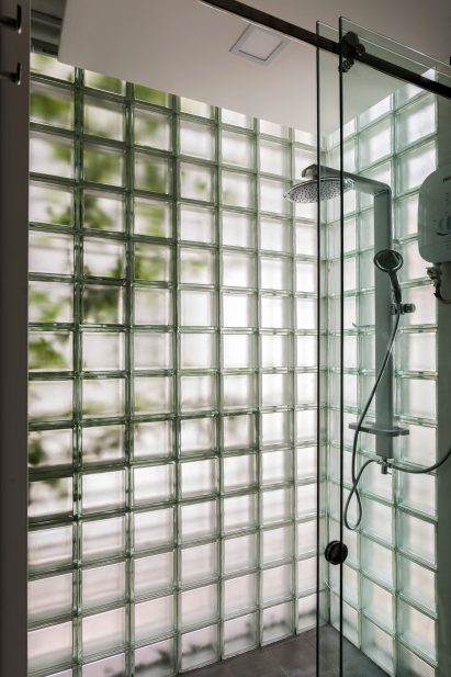 Shower room of Glass-Block Micro House, Vietnam, by ROOM+ Design & Build
