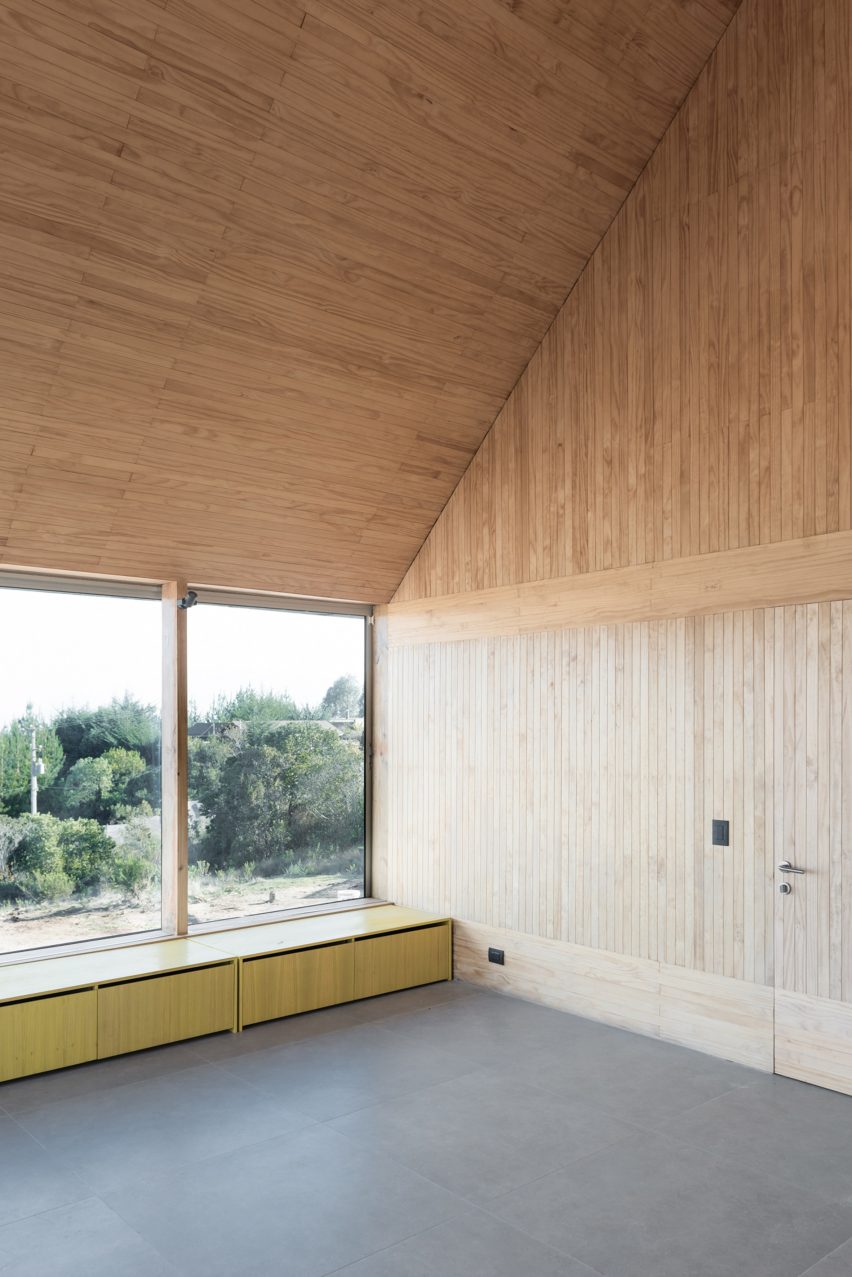 Pinewood interiors inside of SP House by (E)StudioRO in Chile