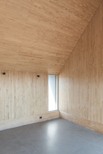 Pinewood interiors inside of SP House by (E)StudioRO in Chile