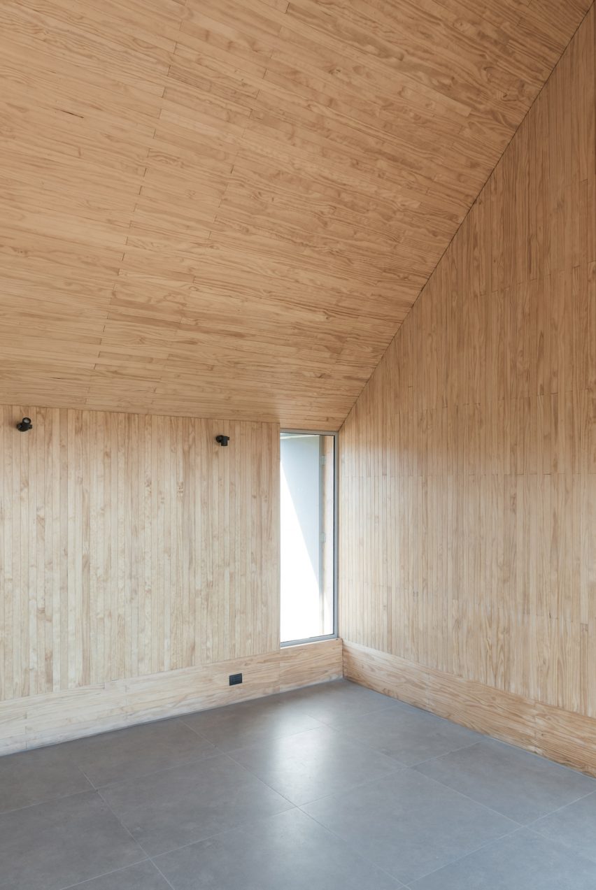 Pinewood interiors inside of SP House by (E)StudioRO in Chile