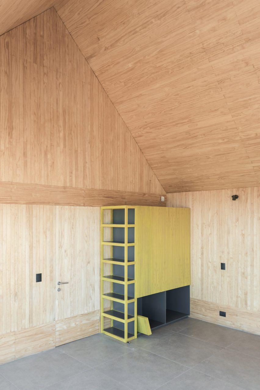 Pinewood interiors inside of SP House by (E)StudioRO in Chile