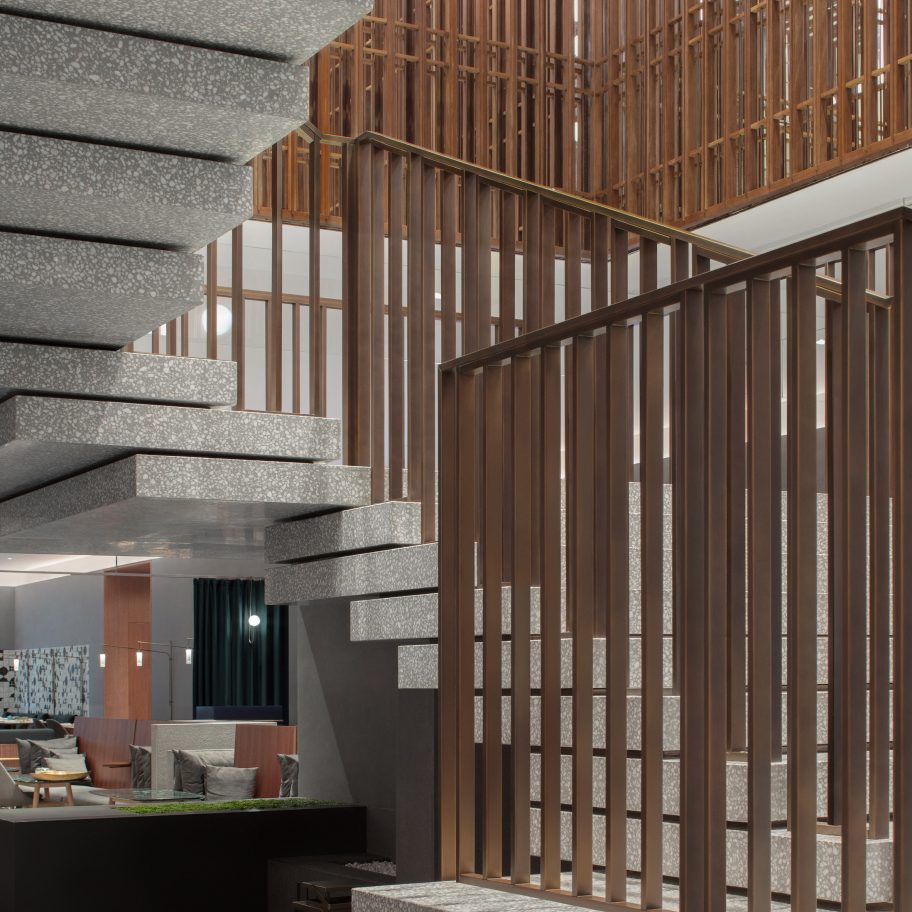 Terrazzo and bronze staircase features in The Sukhothai Shanghai hotel