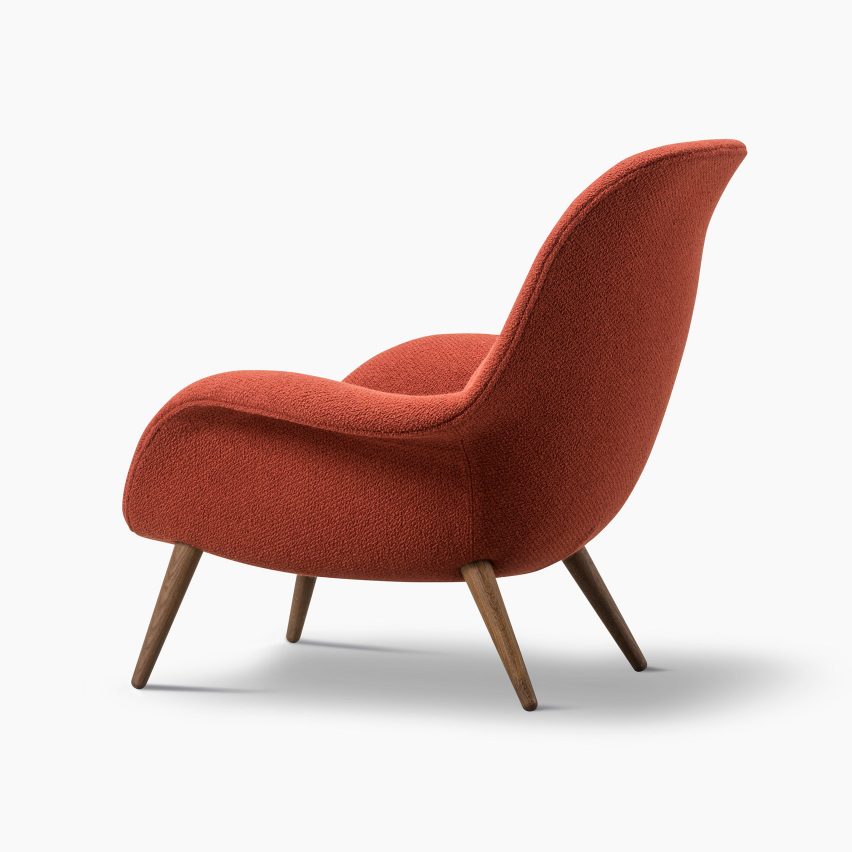 A Swoon lounge chair with wooden legs by Space Copenhagen for Fredericia