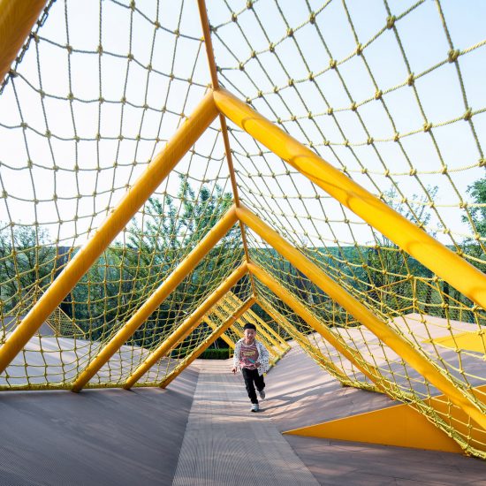 Kid playing at The Folds by Atelier Scale