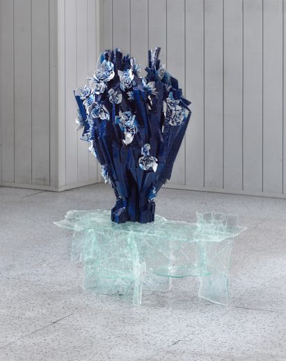 The Creating Through Destroying table from The Metamorphosis collection by Tadeas Podracky