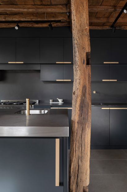 Exposed timber in kitchen built in ruins