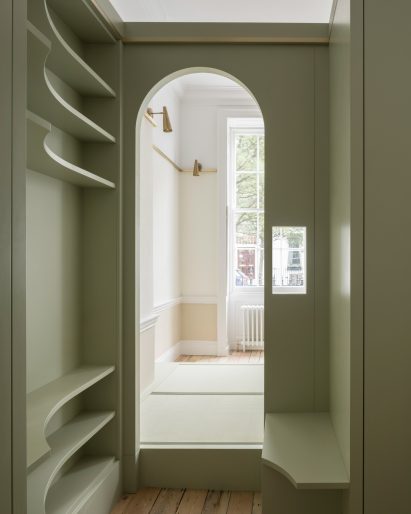 Upper Wimpole Street apartment by Jonathan Tuckey Design includes built-in storage walls