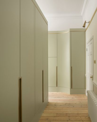 Upper Wimpole Street apartment by Jonathan Tuckey Design includes built-in storage walls
