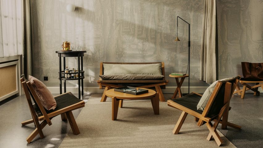 Lounge chairs in bedroom of Volkshaus Basel Hotel by Herzog & de Meuron