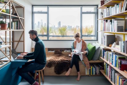 Living room of architect Ben Allen's London flat includes window seat