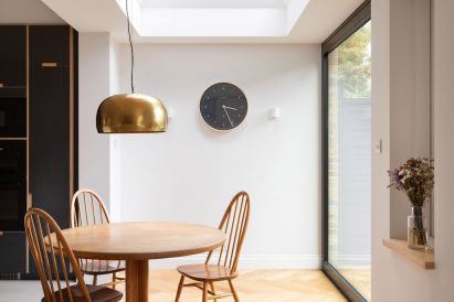 The Charred House dining room by Rider Stirland Architects in London