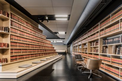 Book shelves in Corporate C office by Esrawe Studio