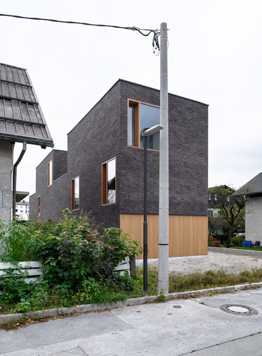 Corner view of The Double Brick House by Arhitektura