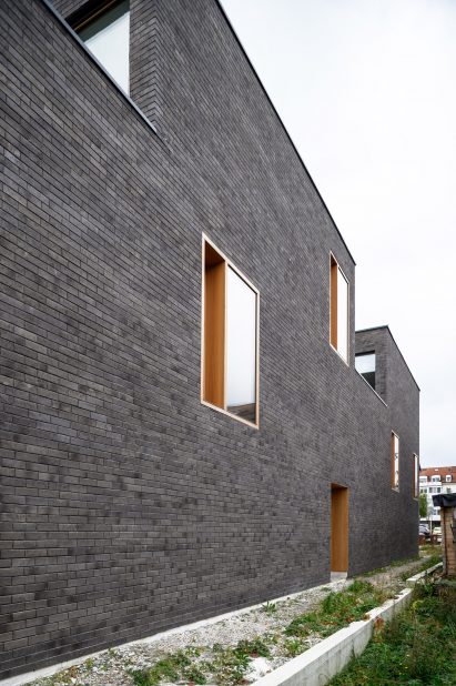 Side entrance at The Double Brick House by Arhitektura