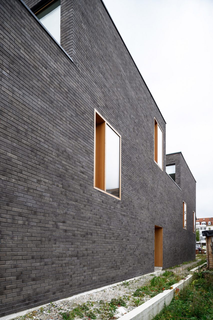 Side entrance at The Double Brick House by Arhitektura