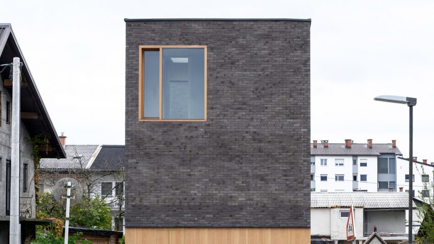 Brick facade of The Double Brick House by Arhitektura