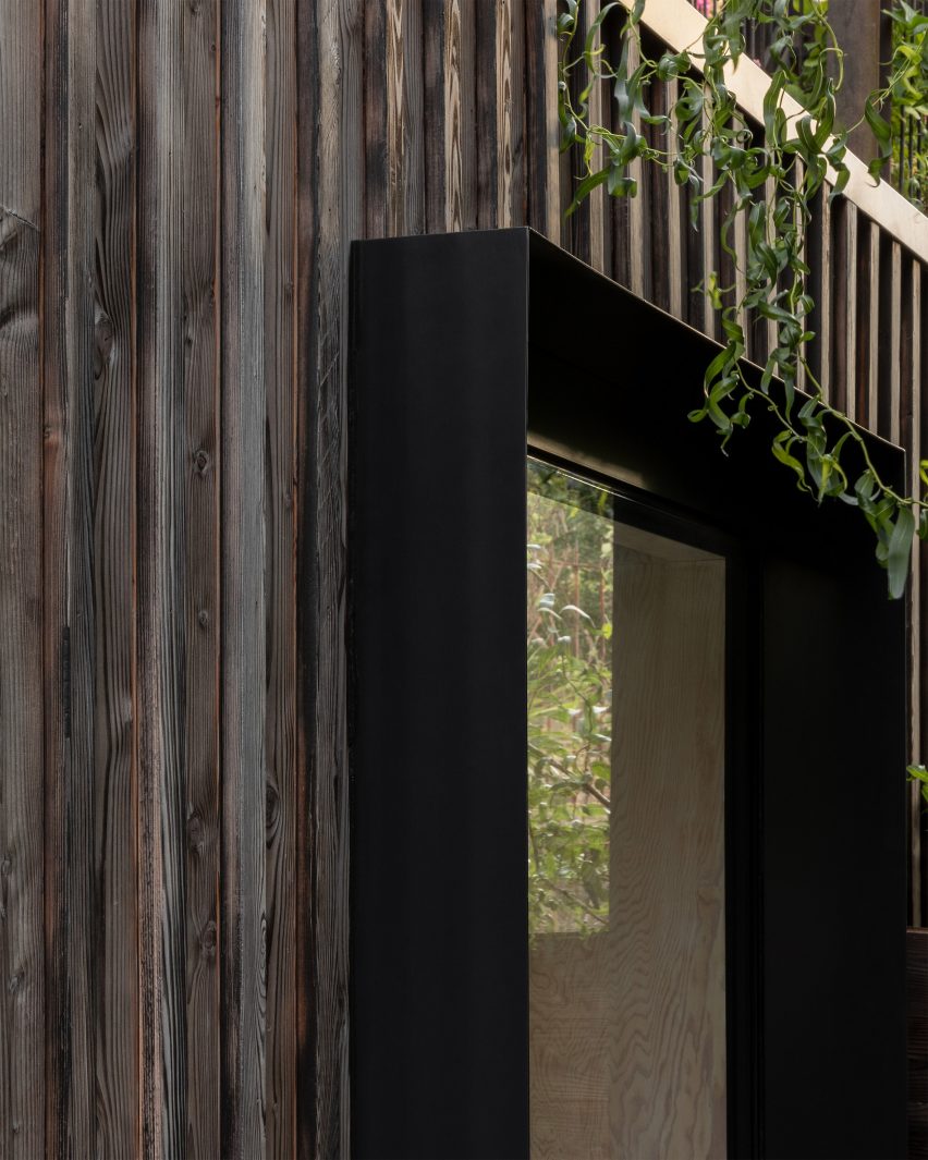 ER Residence by Studio Hallett Ike has a charred larch extension