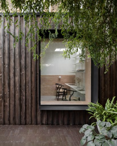 ER Residence by Studio Hallett Ike has a charred larch extension