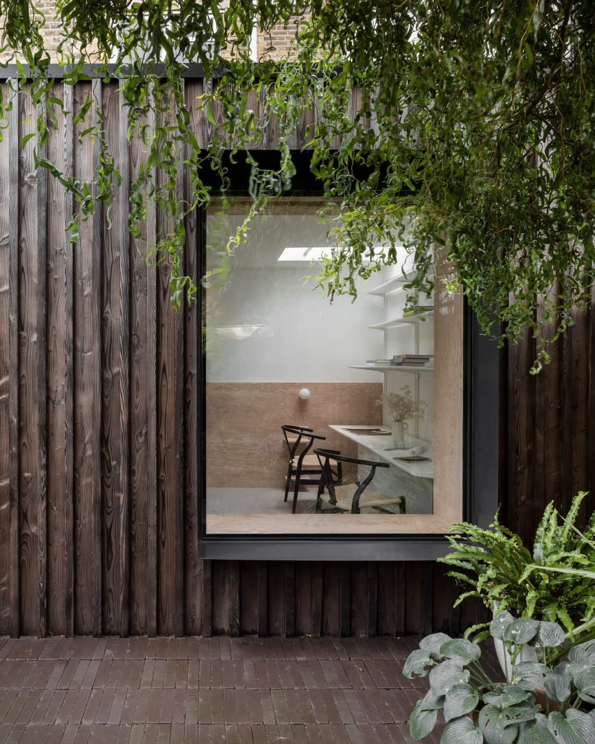 ER Residence by Studio Hallett Ike has a charred larch extension