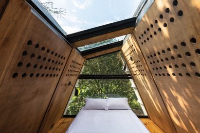 The bedroom inside the Huaira cabin by Diana Salvador and Javier Mera in Ecuador