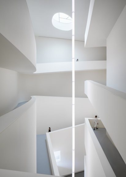 The central void inside Huamao Museum of Art and Education by Álvaro Siza and Carlos Castanheira