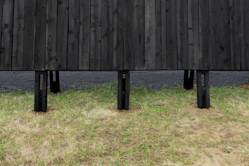 The charred-wood exterior of the Inbetween Pavilion by Pontoatelier