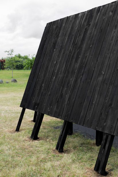 The charred-wood exterior of the Inbetween Pavilion by Pontoatelier