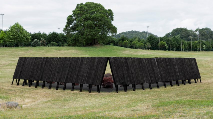 The charred wood exterior of the Inbetween Pavilion by Pontoatelier