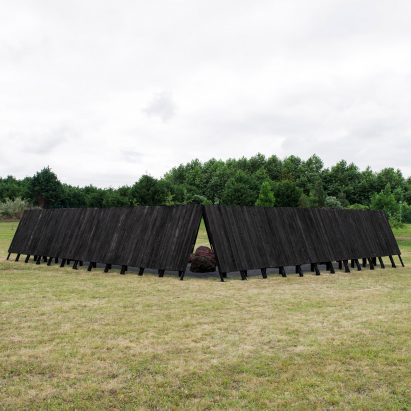 The charred-wood exterior of the Inbetween Pavilion by Pontoatelier