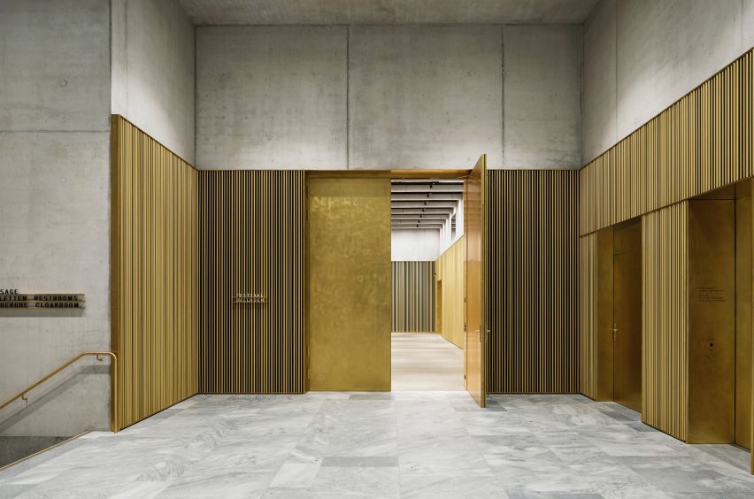 A circulation space inside of the Kunsthaus Zurich museum extension by David Chipperfield