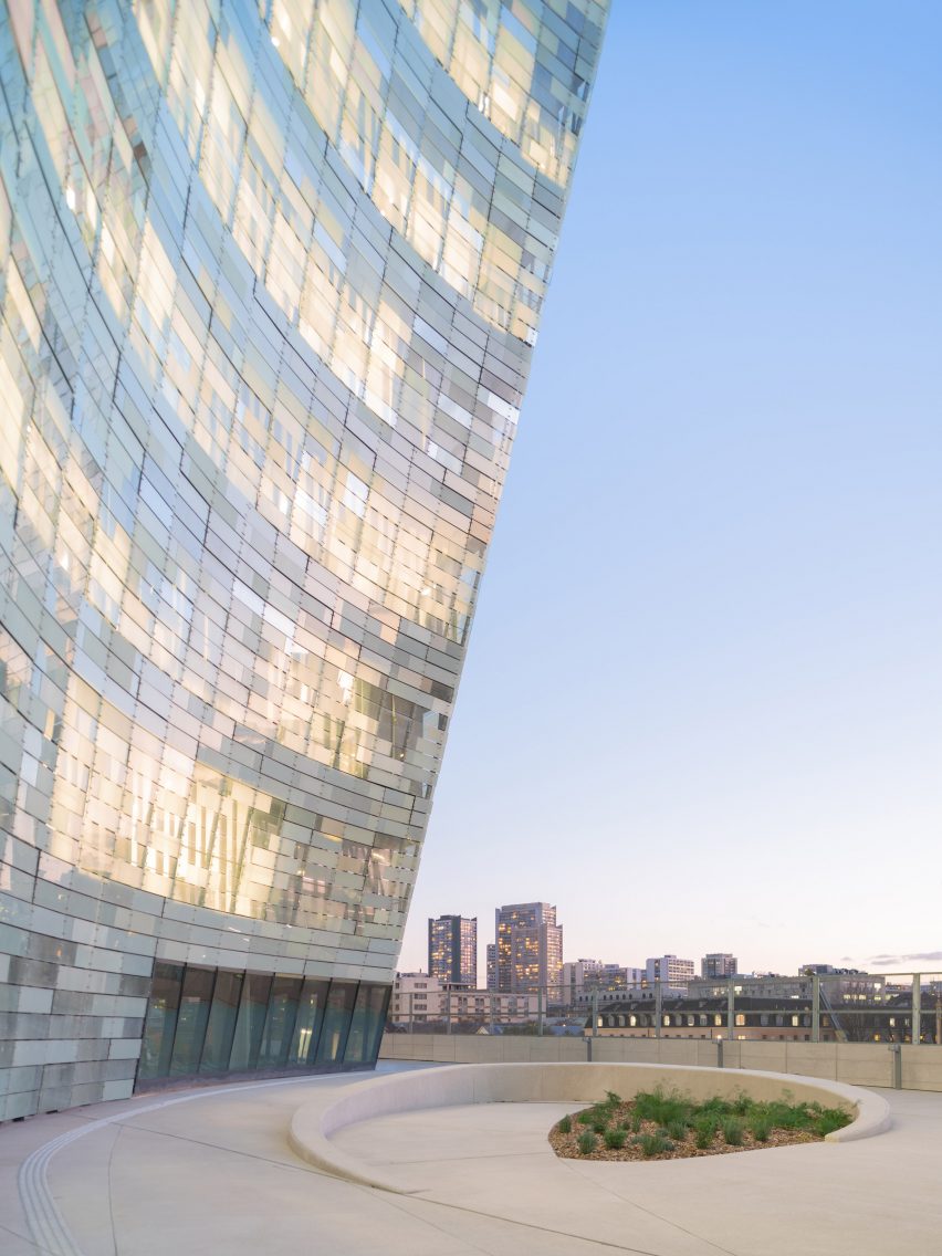 The glazed facade of the Le Monde Headquarters in Paris by Snøhetta