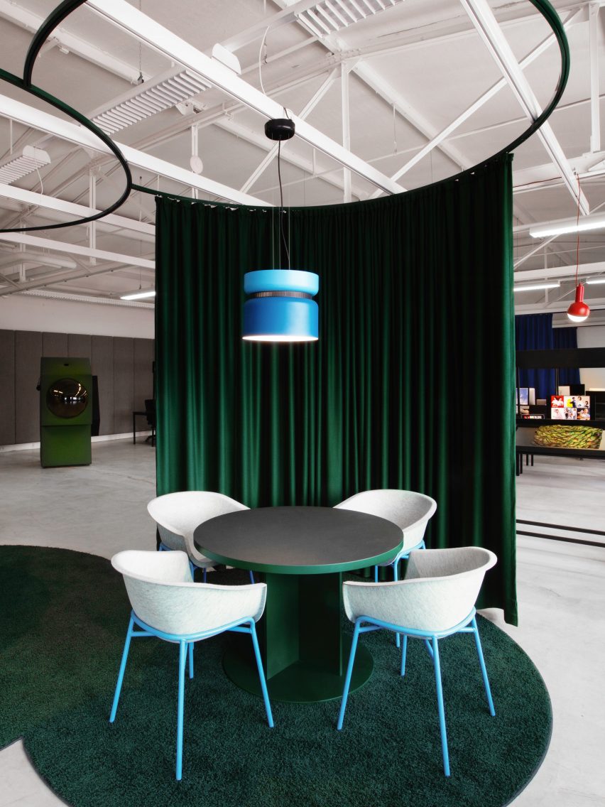 Green curtains in LOQI Activity Office by Studio Aisslinger