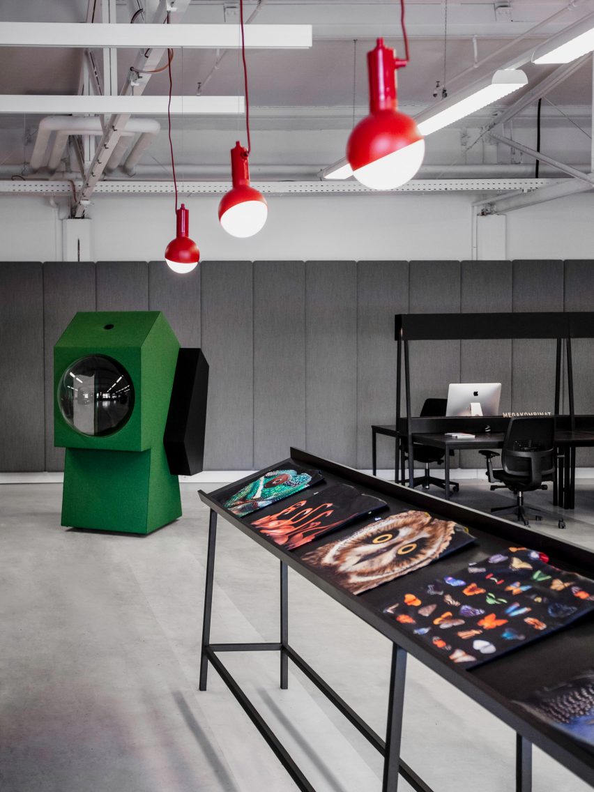 Display stands in LOQI Activity Office by Studio Aisslinger