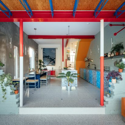 Red and white columns in Mountain View by CAN Architecture