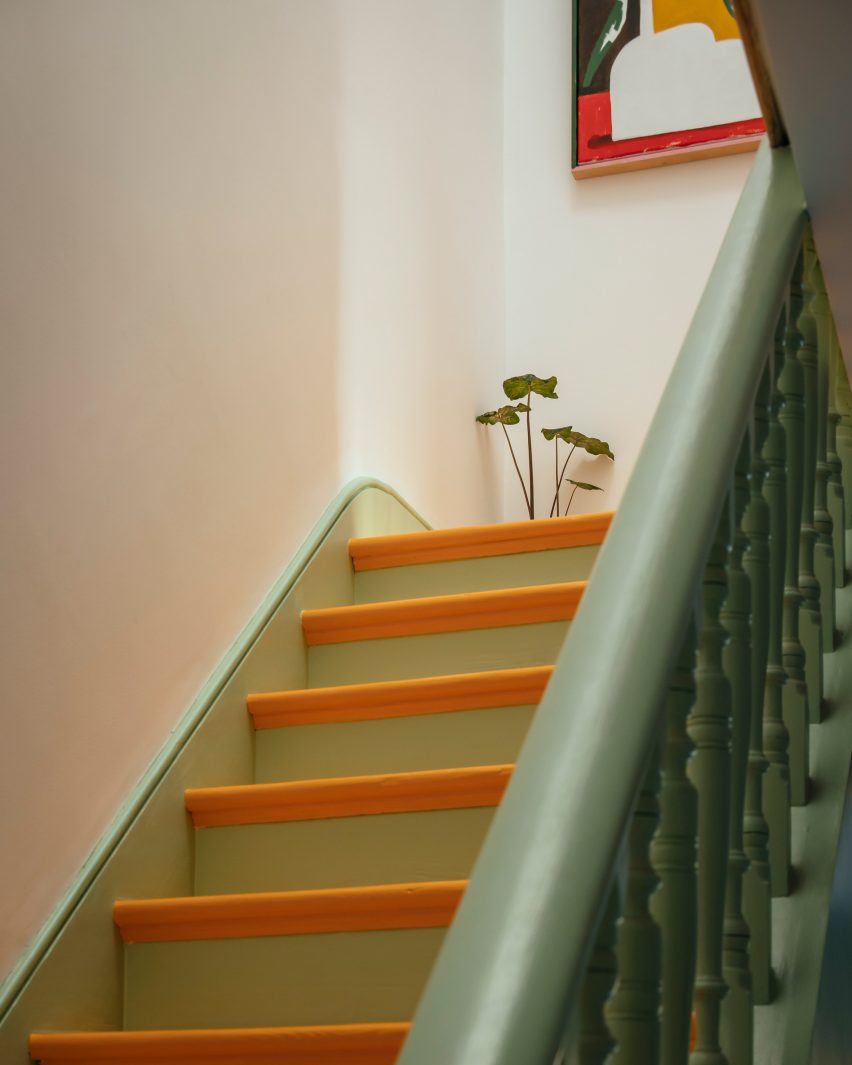 Yellow and green staircase in Mountain View by CAN Architecture