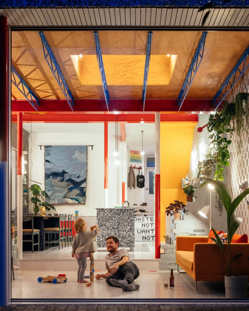 Night view of interior at Mountain View by CAN Architecture