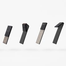 Nendo designs smartphone that folds down “like an inchworm” to the size of a credit card