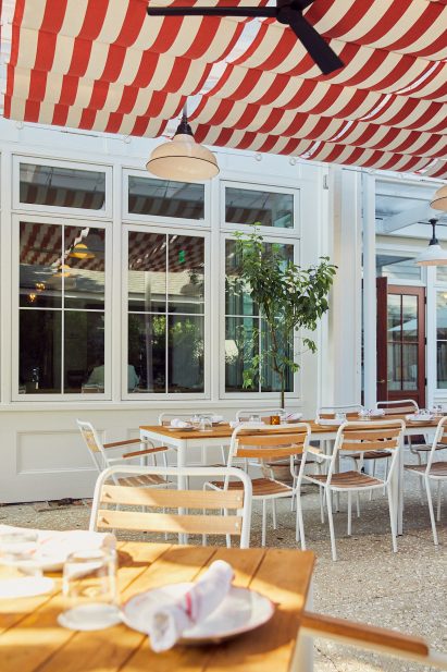 Outdoor dining area of Post House inn in Charleston, South Carolina