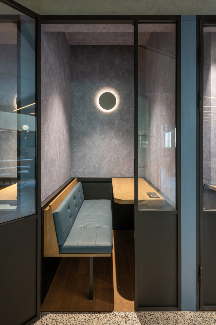 Phone booths inside office designed by Linehouse