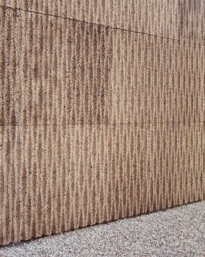 The cork cladding of The House of Wood, Straw and Cork by LCA Architetti