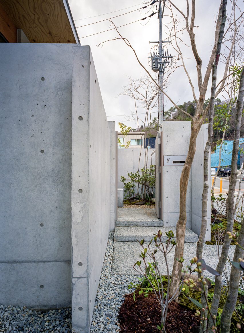 The concrete exterior of a Japanese house by FujiwaraMuro Architects