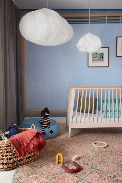 Bedroom with cloud-shaped lights