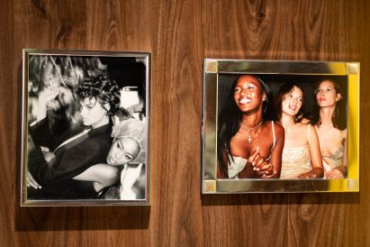 Framed photographs of iconic 90s fashion models