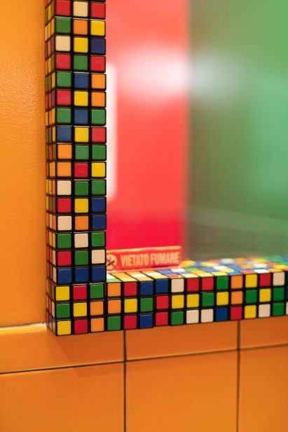 Rubik's Cube mirrors in the bathrooms of Caffettiera Caffé Bar