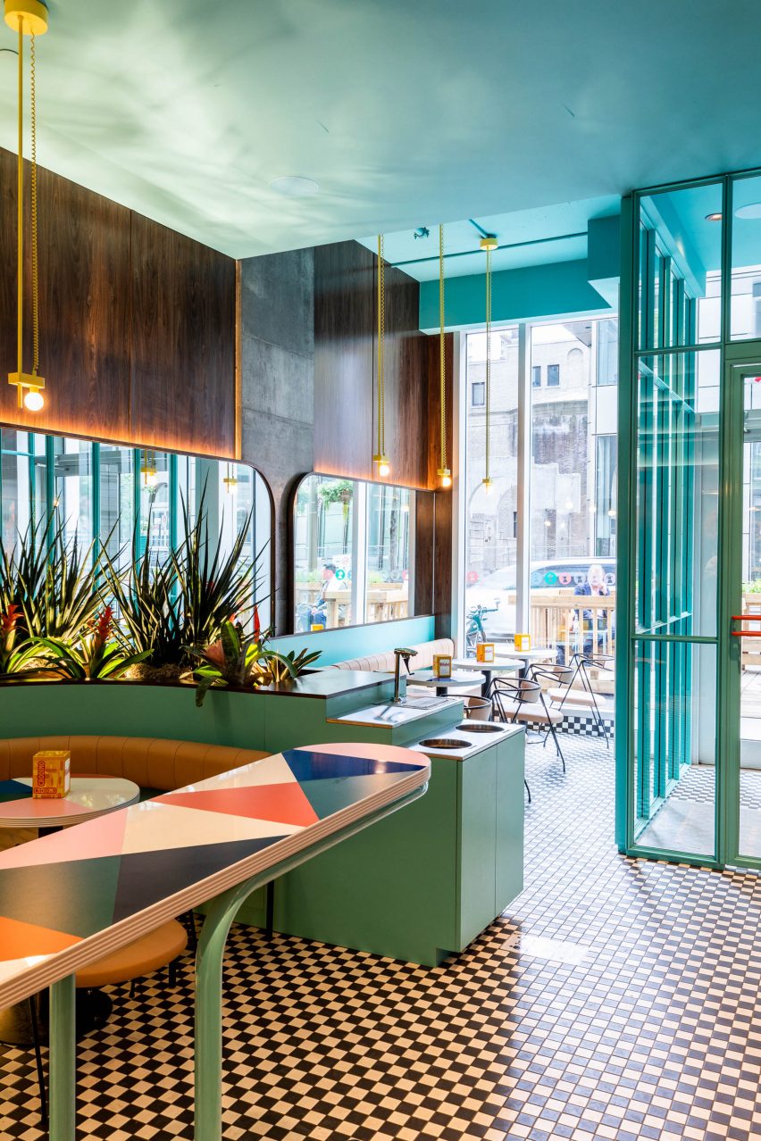 The checkerboard mosaic floor influenced by Vans shoes from inside the cafe
