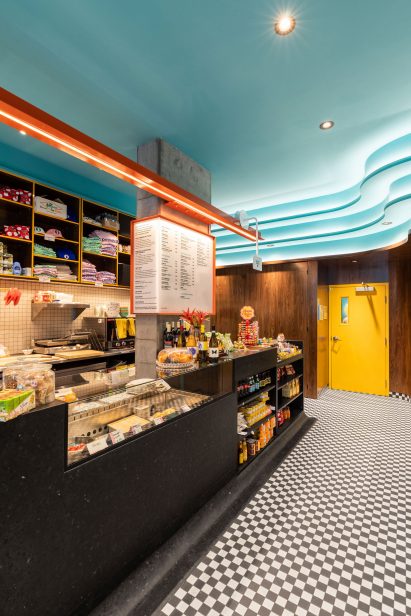 The cafe's checkerboard mosaic floor