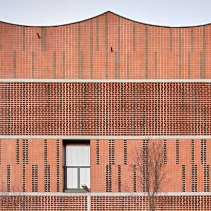 Brick facade of Camp del Ferro sports centre in Barcelona